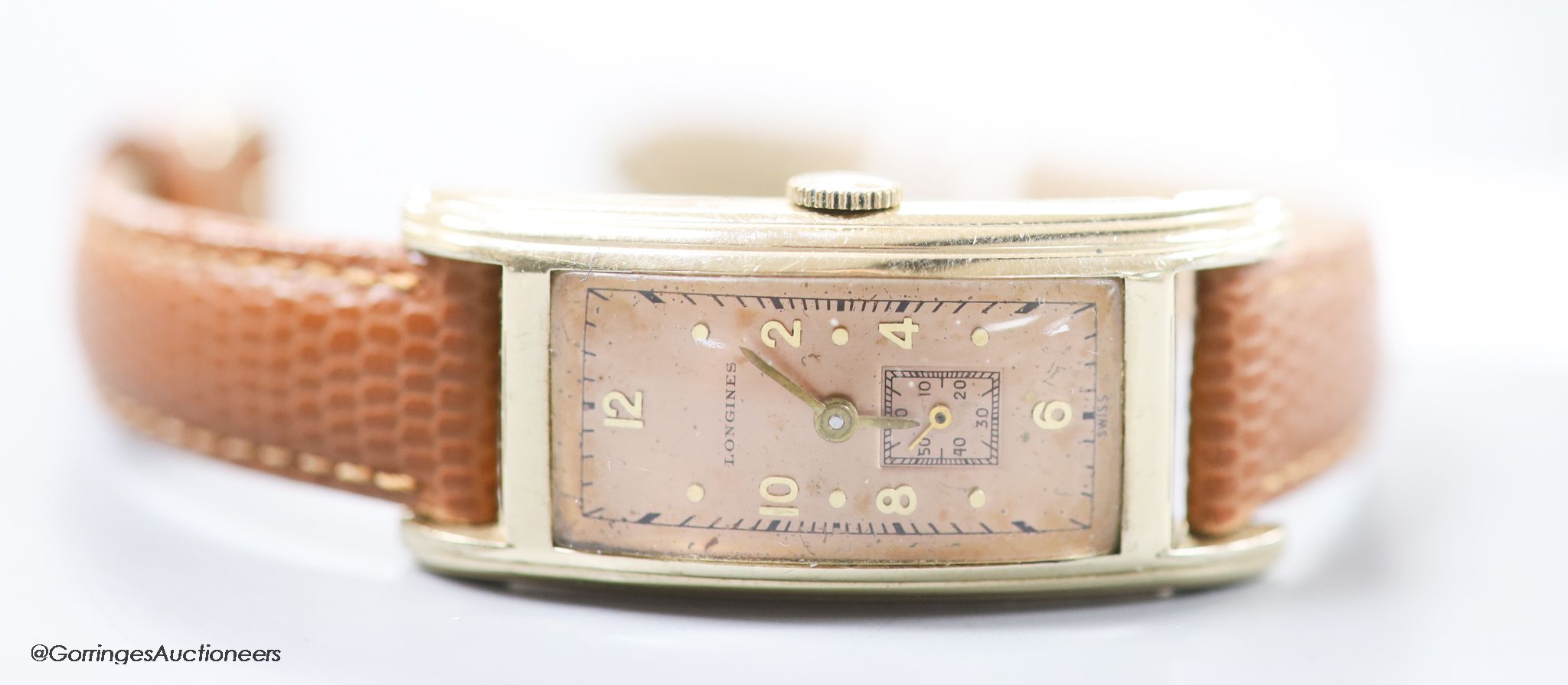 A gentleman's stylish 1930's 10k gold filled Longines manual wind rectangular dial wrist watch, on later leather strap, with subsidiary seconds.